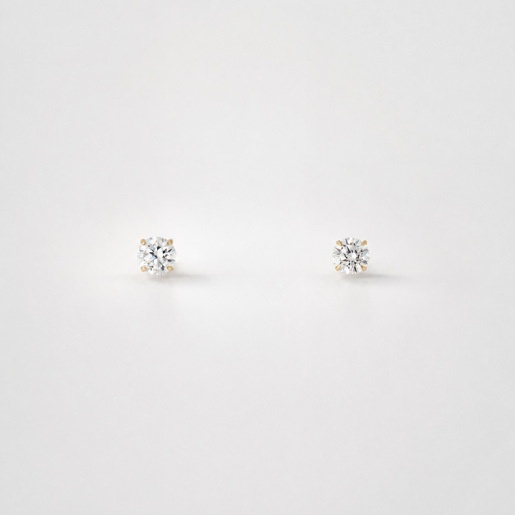 Small Diamond Studs on 14k Gold