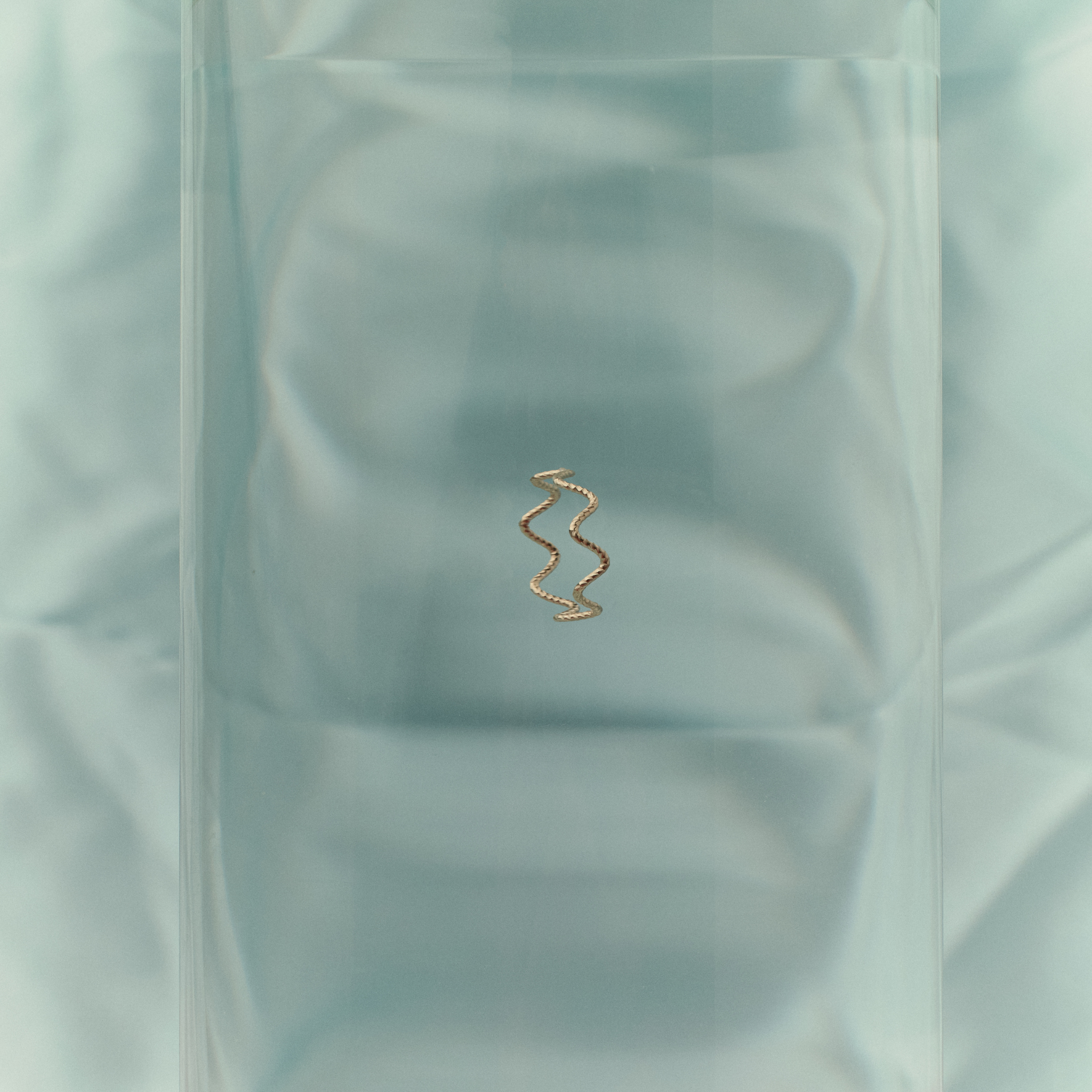 Tania’s Ring softly twisted band in solid 14k gold