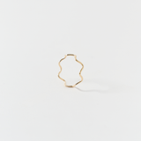 Side view of Tania’s 14k gold twisted band ring