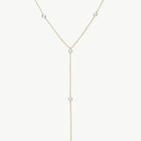 The Plus One 14K solid gold diamond lariat necklace with five floating diamonds