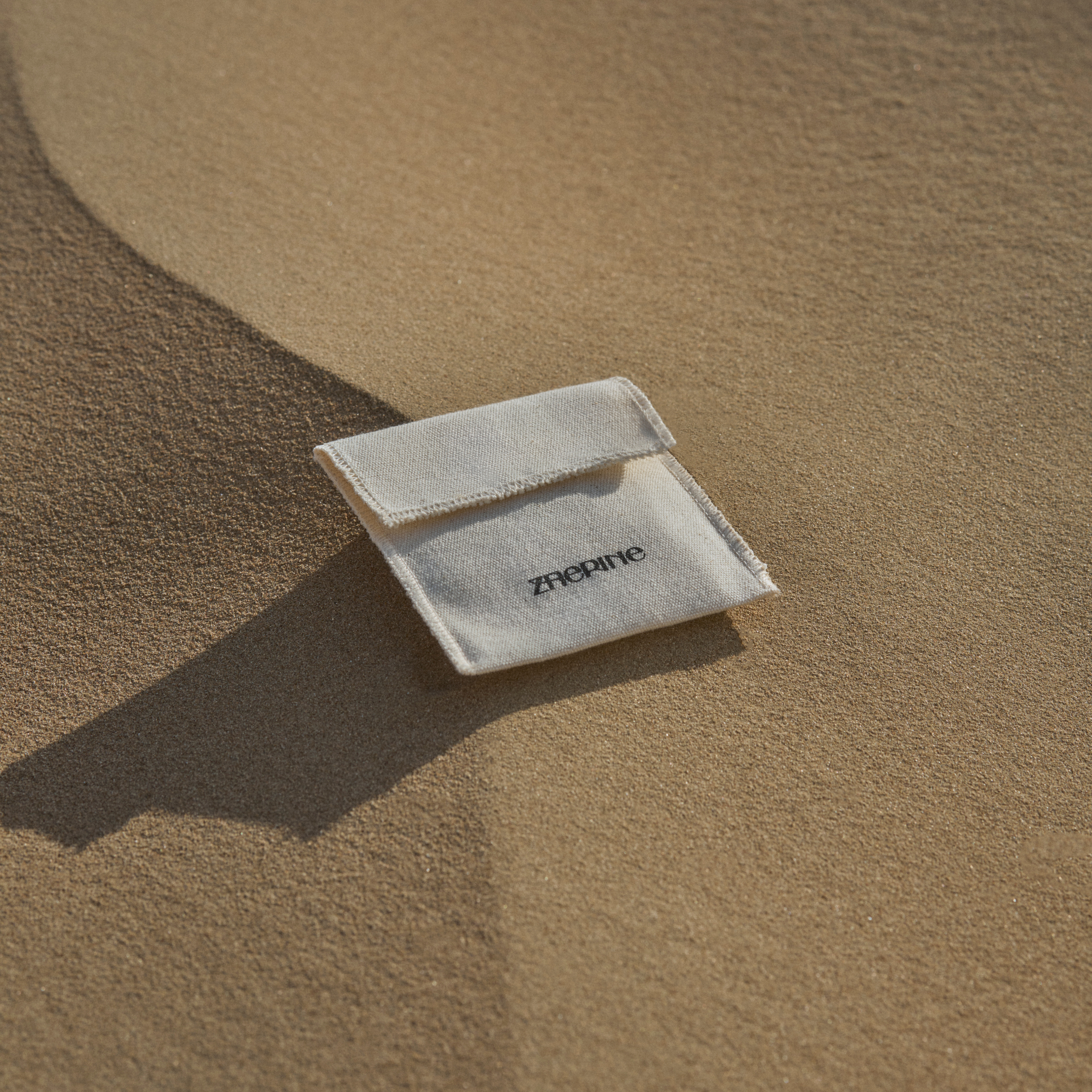 Zaerine jewelry storage bag in soft fabric, designed to safely hold and protect your gold pieces.